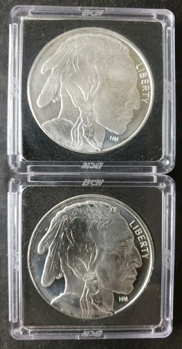 Two HM 1oz Silver Buffalo Rounds in Plastic Holders