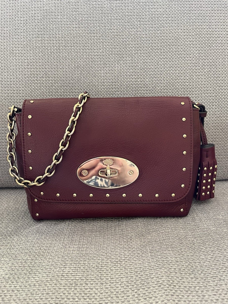 Mulberry Lily Regular in Oxblood with gold studs and tassels