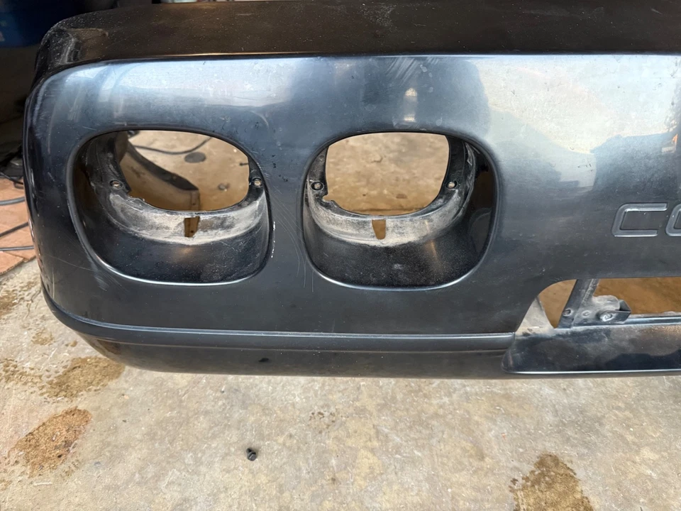 Conjunto de cubierta de parachoques trasero Chevy Corvette C4 1991-1996 negro usado OEM Foto 2 de 4