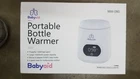 Babyaid Portable Bottle Warmer, Fast Heating w/4 Adapters Cordless White New