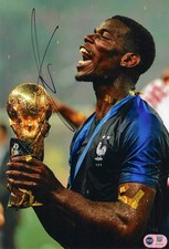 PAUL POGBA SIGNED 12X8 FRANCE 2018 WORLD CUP WIN PHOTO (ACG CERT AG18163)