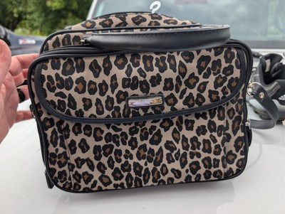 Leopard Print Hand Bag With Shoulder Strap. Front Opens  Clean makeup bag