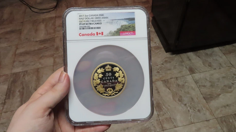Canadá 2017 100 aniversario plata .9999 2 oz. Medio dólar dorado dorado NGC PF 69 Foto 2 de 4