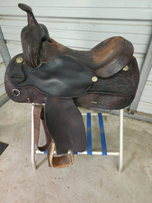 A Used 16" Brown Color Hereford Tex Tan trail Saddle with Some Tooling