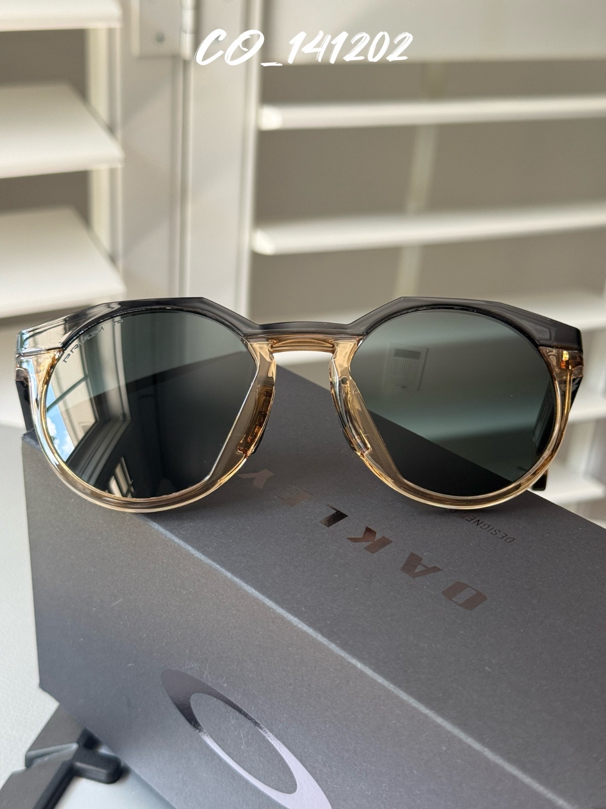 Gafas de sol Oakley HSTN marco ámbar/negro lentes negras Prizm