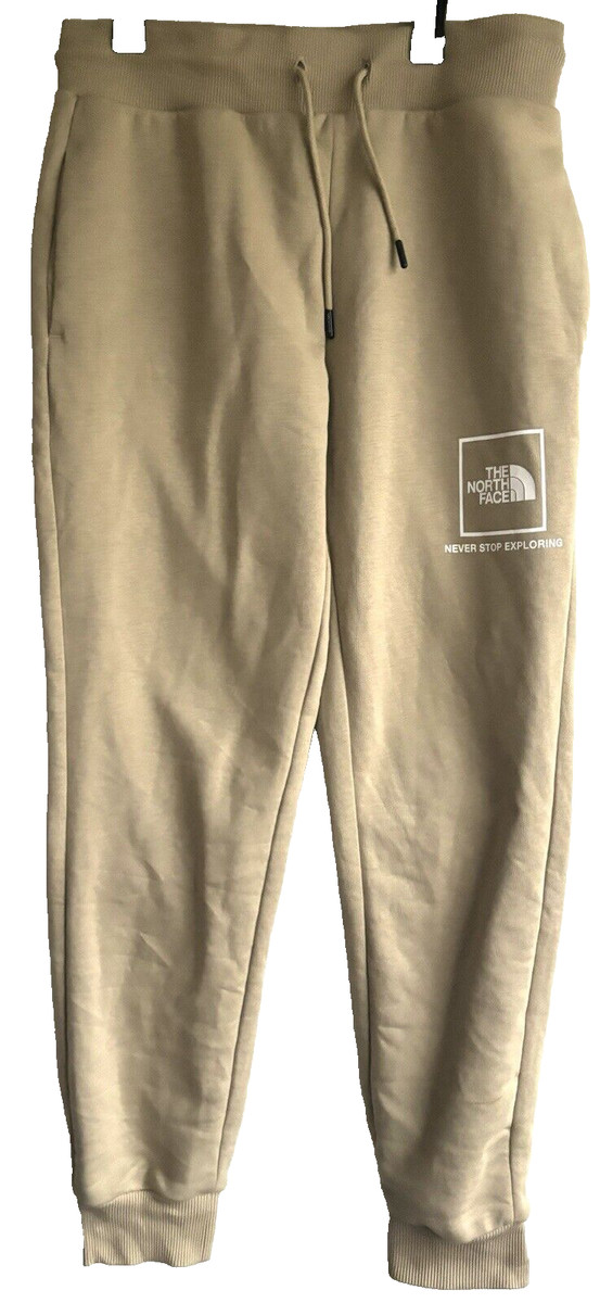 Women’s The North Face Sweatpants Tan Size M Joggers Never stop exploring Logo