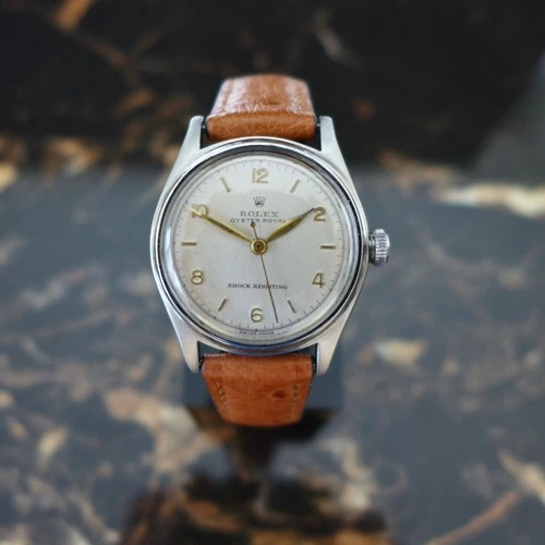 A STUNNING VINTAGE 1947 MID-SIZE ROLEX OYSTER ROYAL WRISTWATCH STEEL REF. 4444