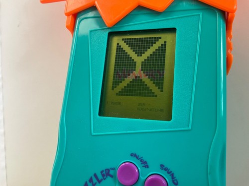 Tested ! Nickelodeon Nick Puzzler Teal Green Handheld Travel Game Electronic LCD - Picture 4 of 13