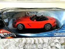 RED DODGE VIPER SRT- 10 1/18 MODEL CAR BY HOTWHEELS. BOXED.