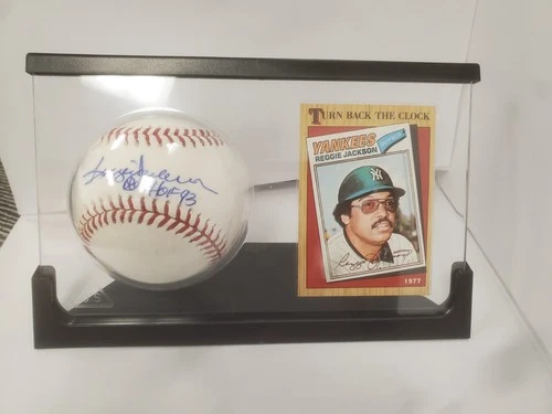 Reggie Jackson Signed Baseball Yankees with Trading Card. JSA AUTHENTIC