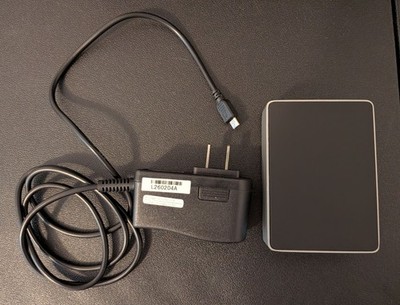 Raspberry Pi Model 3B with Flirc case, SanDisk 64GB micro SD card, AC adapter