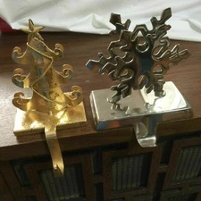 Lot Of Two metal snowflake & christmas tree Stocking Hangers A324