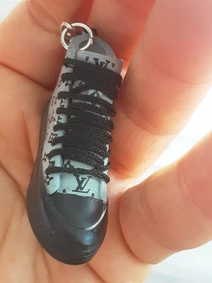 Louis Vuitton  LV logo Keychain   iconic zipper pull