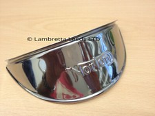 NORTON MOTORCYCLE HEADLIGHT PEAK. NORTON LOGO EMBOSSED ONTO LIP. STAINLESS STEEL