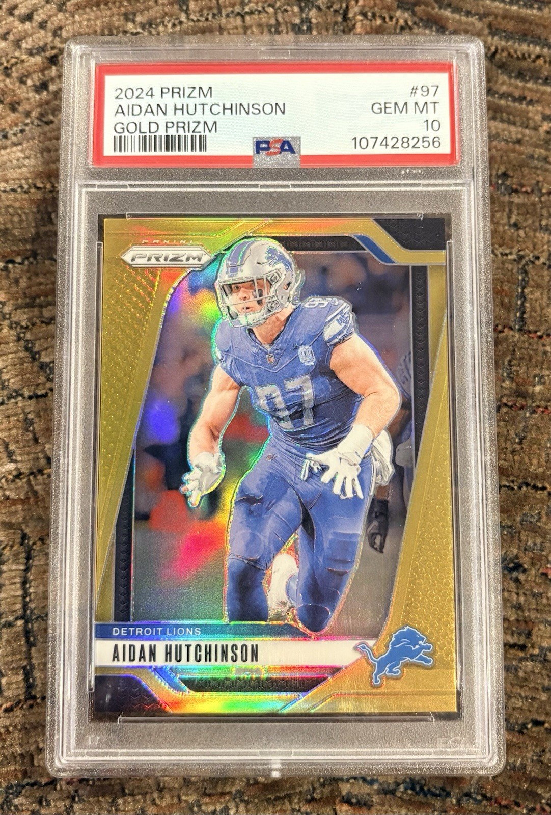 2024 Panini Prizm #97 Aidan Hutchinson True Gold Prizm /10 PSA 10 (POP 3)