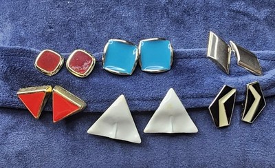 Mixed vintage condition   some pieces show wear, yellowing, or finish loss; clip