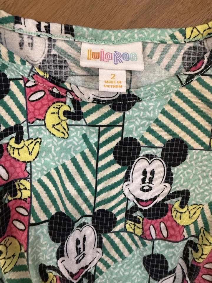 Vestido LuLaRoe X Disney Mae Niñas Talla 2 Mickey Mouse Verde Azulado Diseño Retro Bolsillos Usado en Excelente Condición Foto 2 de 4