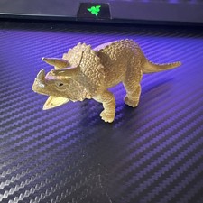 Tan Dinosaur Triceratops Figurine, China, 4 3/4" long, Rubber 010-16 