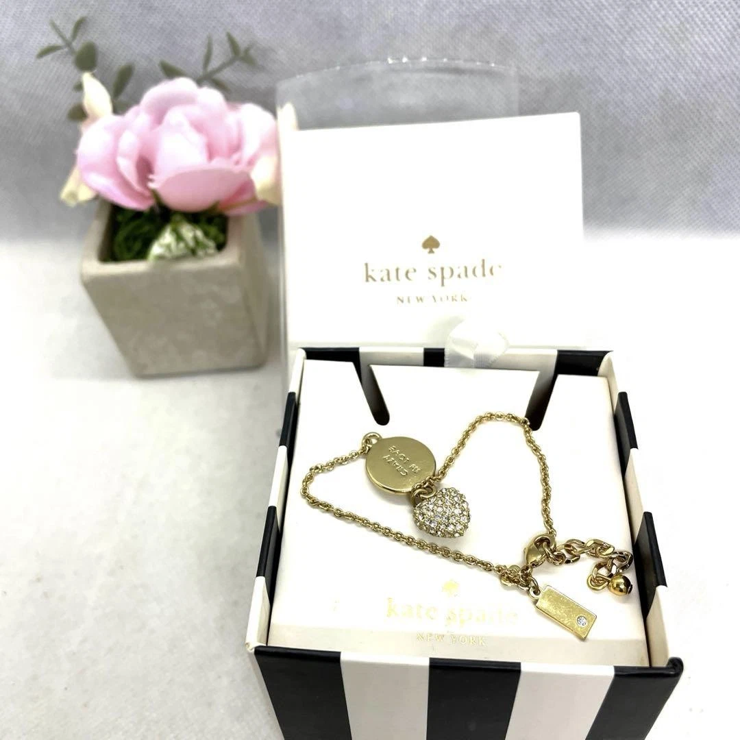 Bracciale KATE SPADE con charm oro