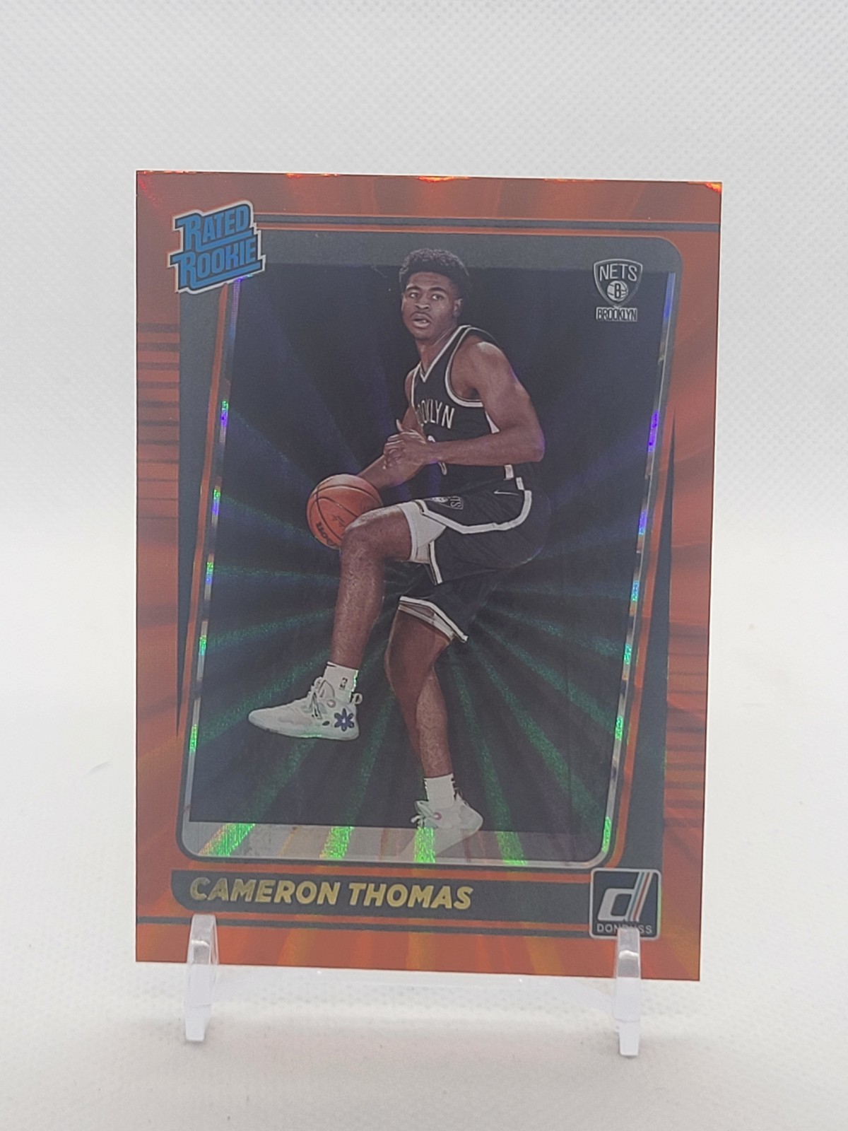 2021-22 Panini Donruss - Rated Rookie Cameron Thomas #203 Holo Orange Laser (RC)
