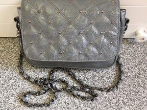 grey studded bag