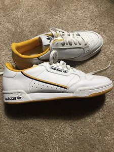 adidas continental yellow stripe