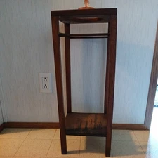 Vintage Standing Ash Tray Wood And  amber glass .