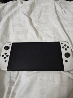 Nintendo Switch OLED Model Console with White Joy Con & Black Pro Controller