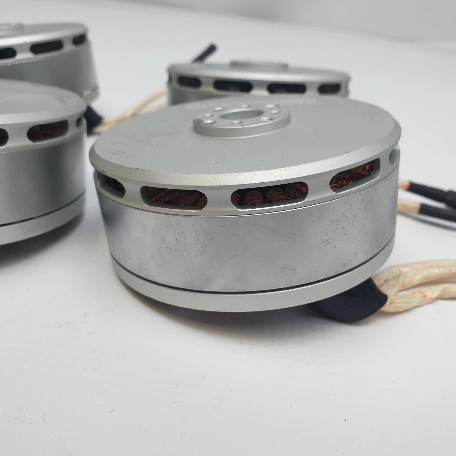 Heven Drones KV120 motors from the side, showing vented silver housings