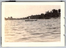 Vtg B&W Snapshot Rowboat On Lake With Man In Hat 1940s