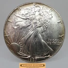 1987 American Silver Eagle 1 oz .999 Silver, Toned - #C59466NQ