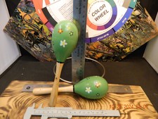 Painted Wood Green Maracas with Red White Blue Flowers differing tones