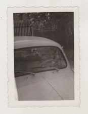 Cheerful Duo Playful Banter Behind the Wheel Creates a Delightful Snapshot Photo