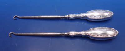 Antique pair of sterling silver button hooks by Webster Co.
