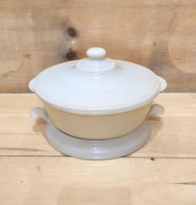 Fire King Custard/French Ivory Covered Casserole With Matching Hot Plate.