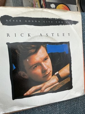 Rick Astley.  Never gonna give you up.  . 7  vinyl..  1987. RCA