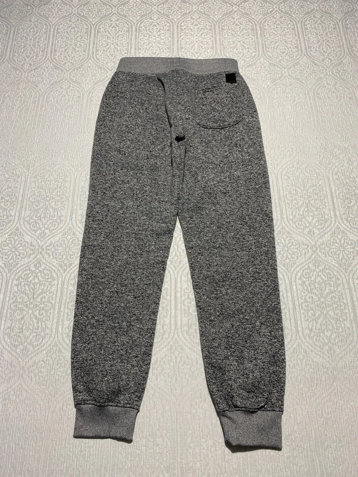 Pantalones deportivos Southpole medianos de vellón para salón bolsillos deportivos Foto 2 de 4