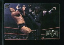 1999 WWF Wrestling vending sticker Undertaker kicking The Rock Dwayne Johnson