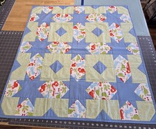 Handmade Baby Quilt Featuring Blue Stars And Orange Dinosaurs
