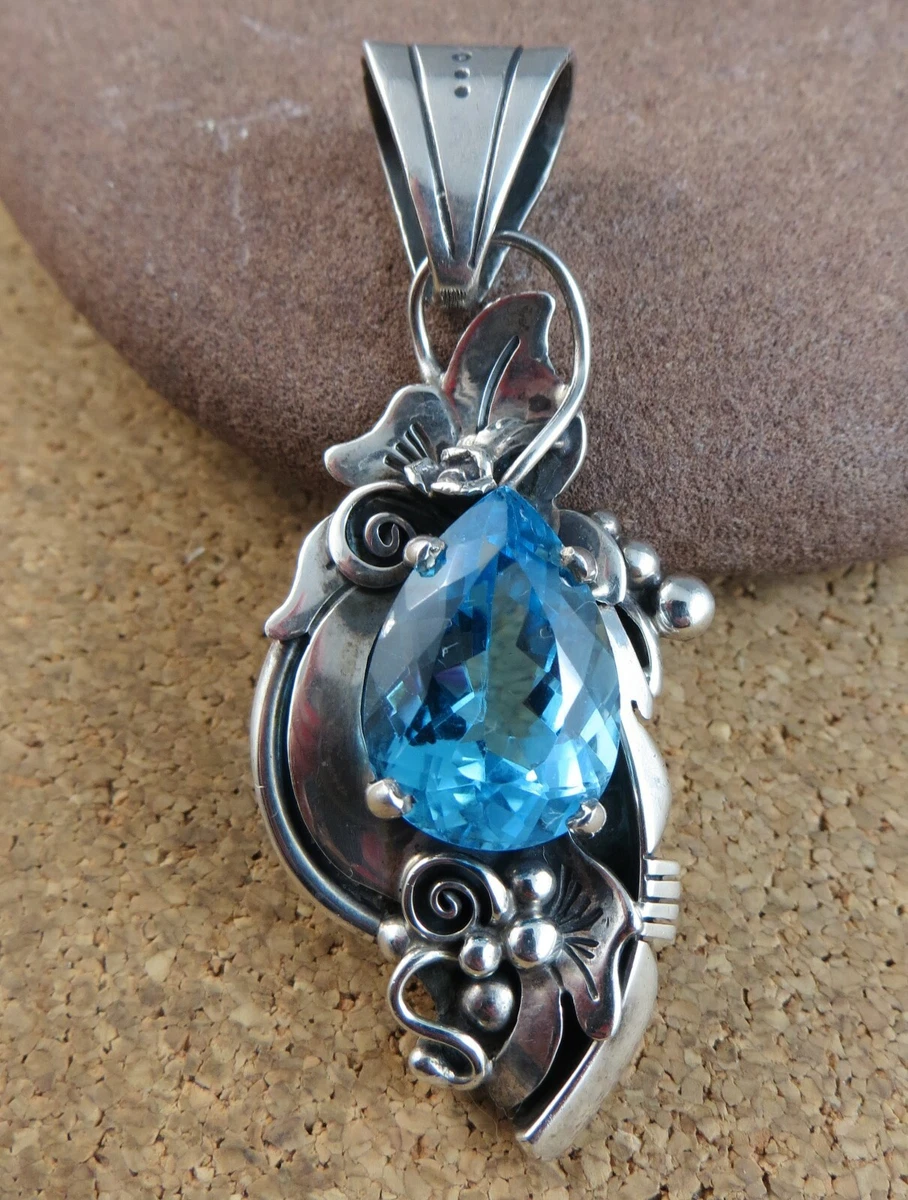 Blue topaz hotsell silver pendant