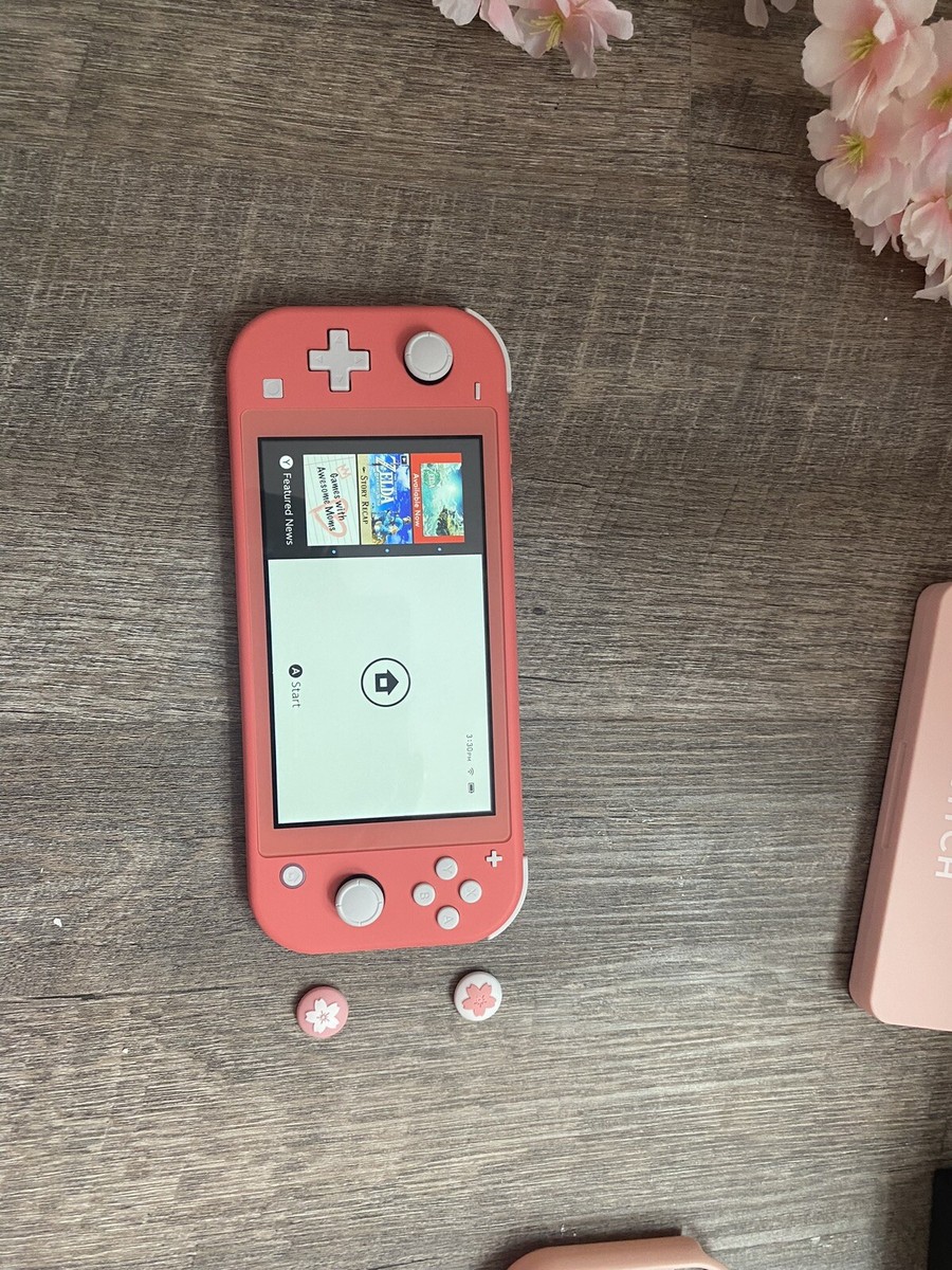 Nintendo Switch Lite￼ Coral 51a34cWPBhL.jpg_BO30,255,255,