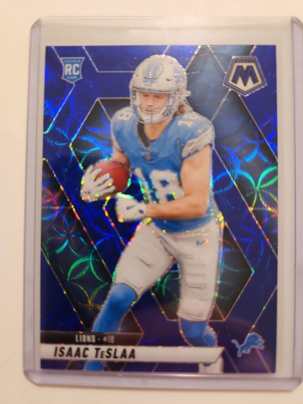 2025 Panini Mosaic - Rookies Isaac Teslaa #319 Blue Scope Prizm (RC)