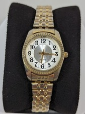 Womans Silver Tone Dial Round Gold Tone Case Stainless Stretch Band Watch