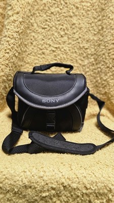 Sony LCS-X20 black padded camera bag with front buckle closure, adjustable strap