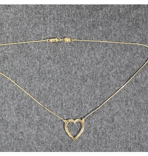 beautiful vintage costume jewelry 1928 gold tone heart necklace