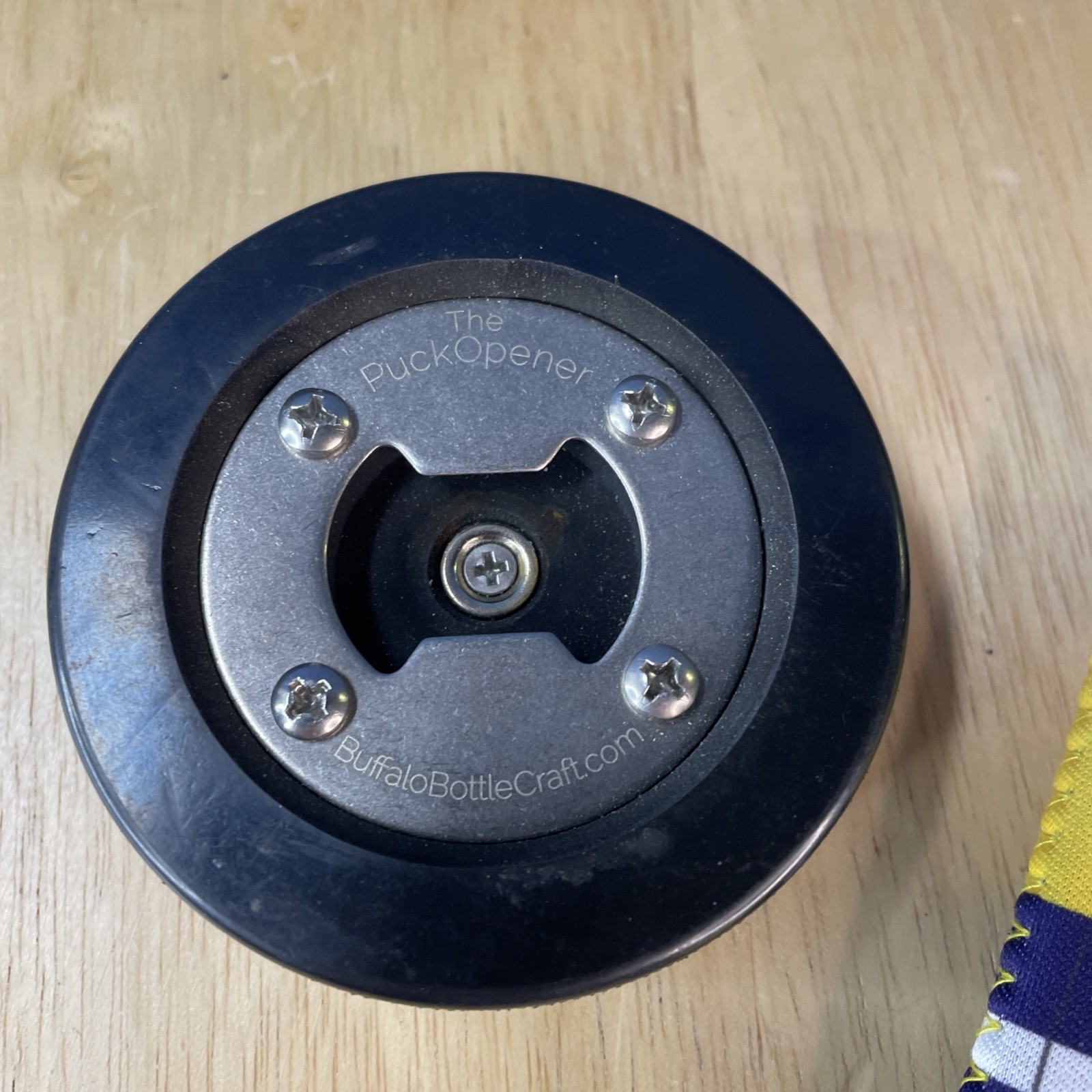 HOCKEY PUCK BOTTLE OPENER - Howies Hockey Tape Branded with FREE KOOZIE!