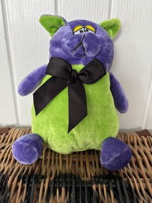 Lila und grün Stofftier Plüsch Samt schwarze Schleife Kinder spielen Monster