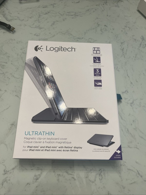 LOGITECH ULTRATHIN magnetic clip on KEYBOARD FOLIO CASE FOR iPAD  mini open box 