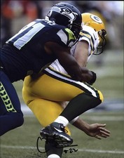 Chris Clemons signed NFL football 8x10 photo W/Cert Autographed 01
