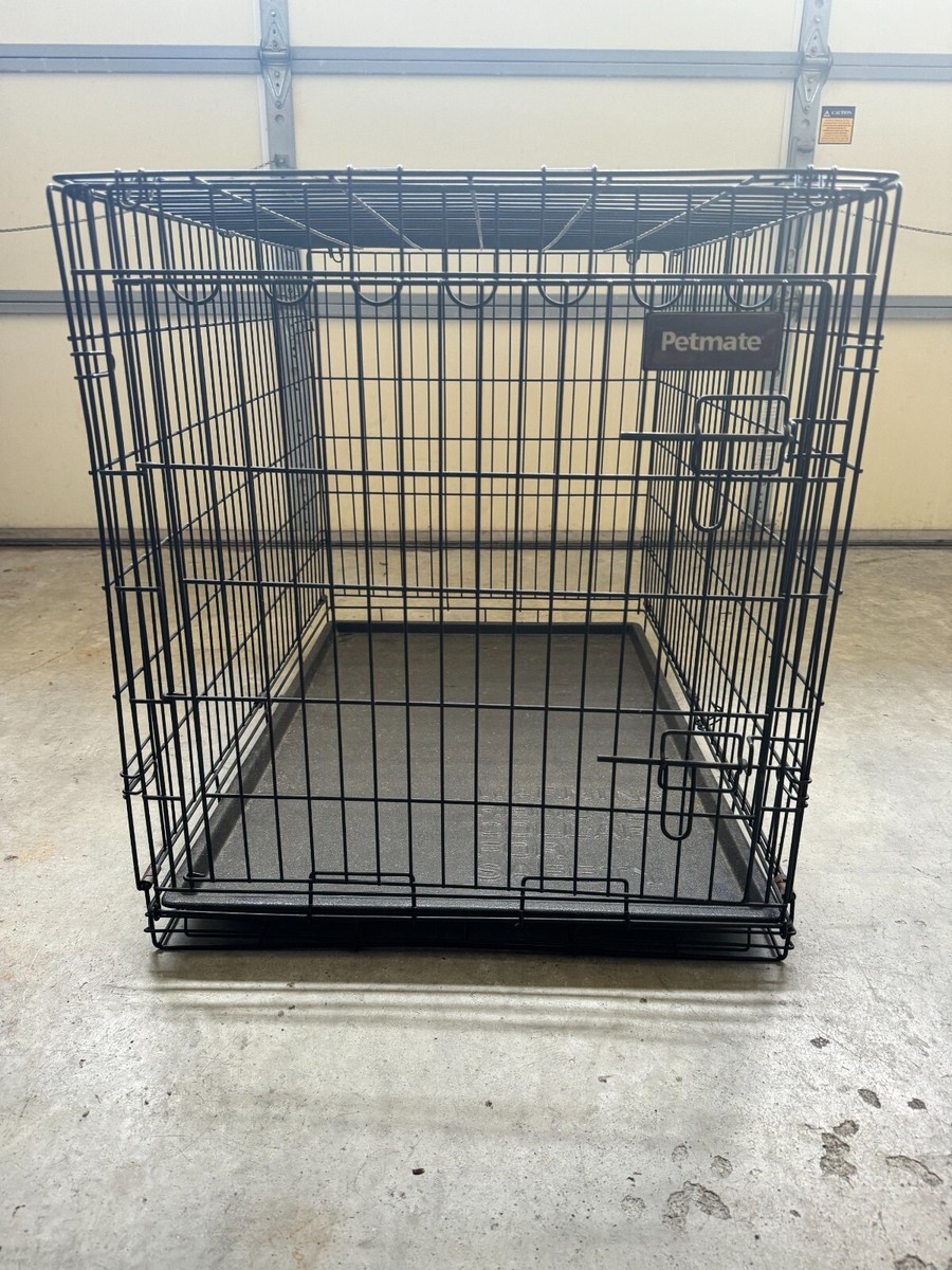 Black metal dog crate for medium sized dogs with black plastic mat